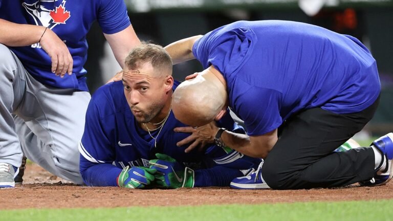 Blue Jays' George Springer hit in head with 96 mph fastball, leaves game with help of trainers