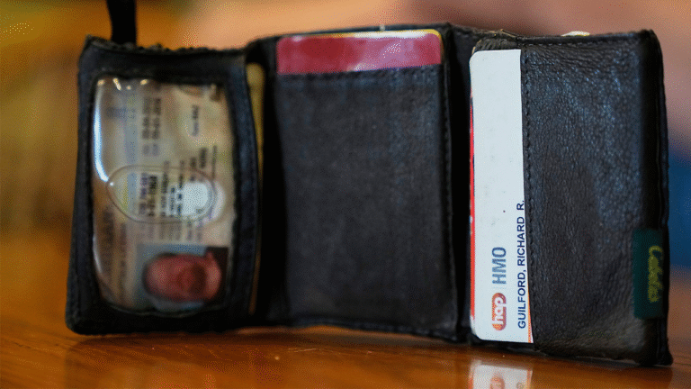 Mechanic finds Ford assembly worker's lost wallet in vehicle hood from 11 years ago