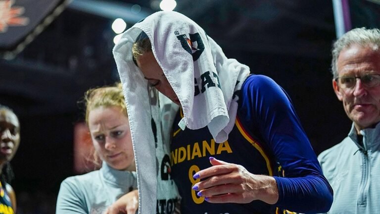 Sophie Cunningham helped off court after brutal knee injury forces early exit from Fever game