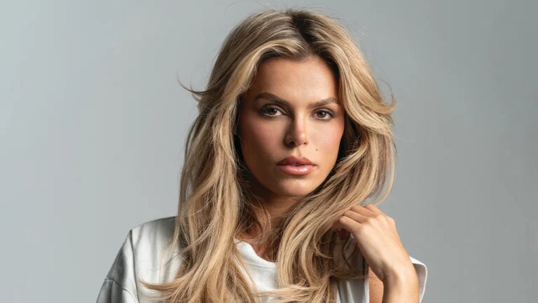 Brooks Nader poses topless while revealing how she left her 'extremely conservative' upbringing for model life