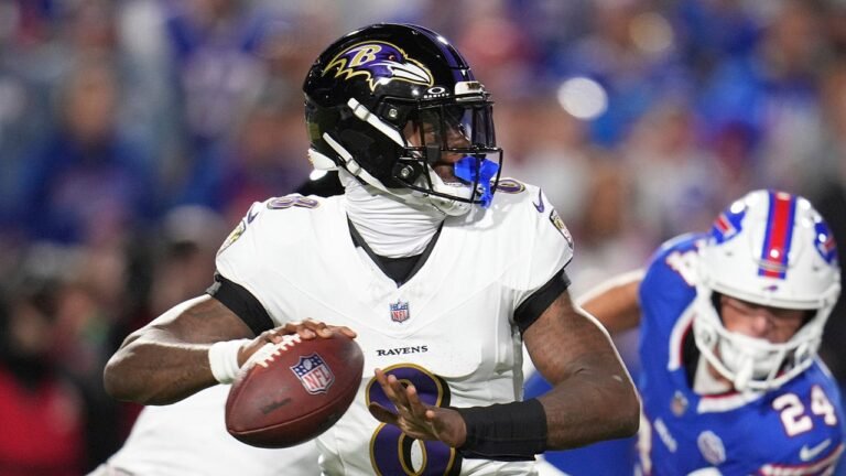 Ravens' Lamar Jackson shoves fan after getting smacked in helmet following TD strike