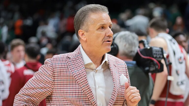 Coach Cal, self-described 'poor, miserable, sinner,' left Kentucky for Arkansas after chat with priest