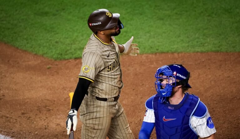 Padres players held back after confronting umpires following controversial season-ending loss to Cubs