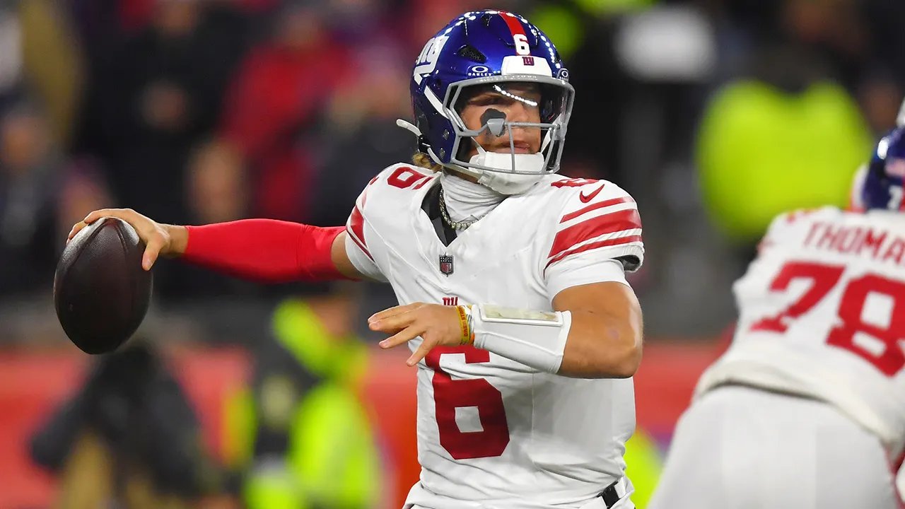 Giants' Jaxson Dart takes huge hit from Patriots linebacker, sparking sideline skirmish