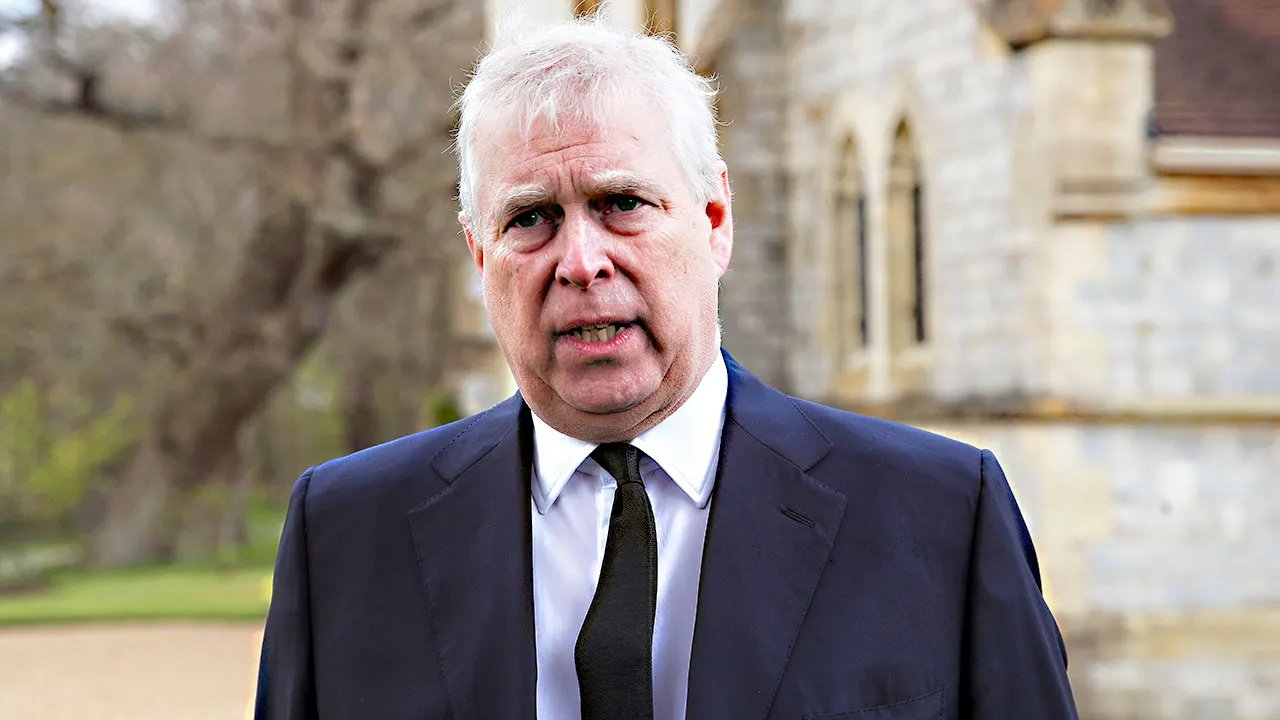 Ex-Prince Andrew photographed kneeling over woman in latest DOJ Jeffrey Epstein file release