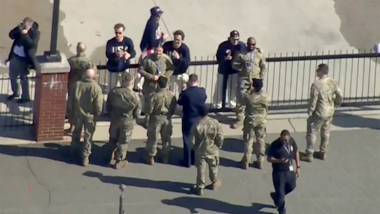 US men's hockey stars share gold medal moment with military members before White House visit