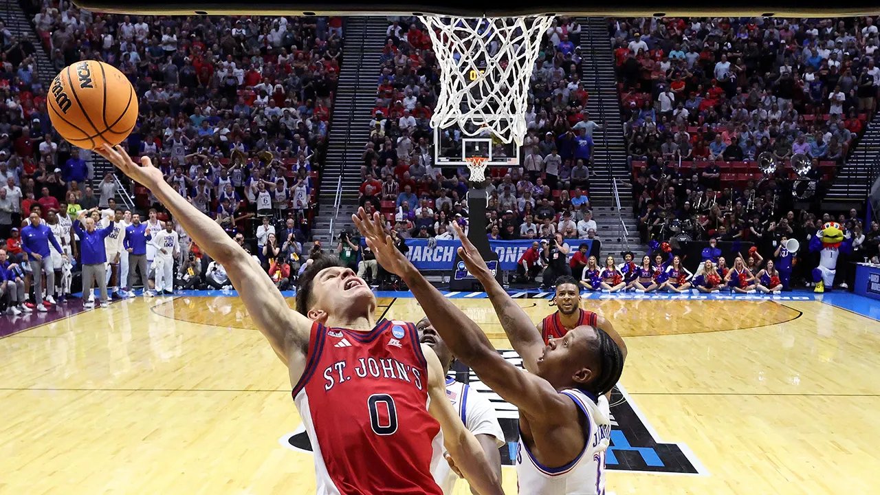 St John's sends Kansas packing with dramatic buzzer-beating layup in NCAA Tournament
