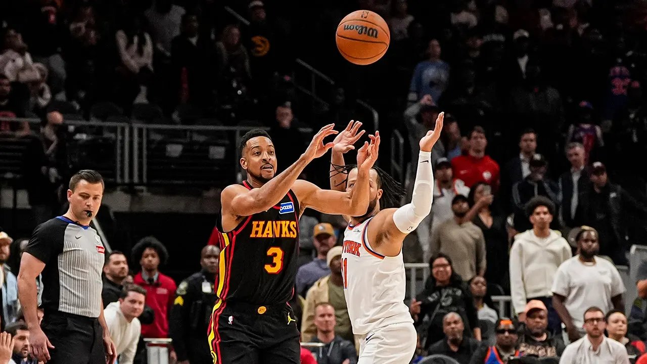 Hawks' last-second heave is too late as Knicks hang on for win