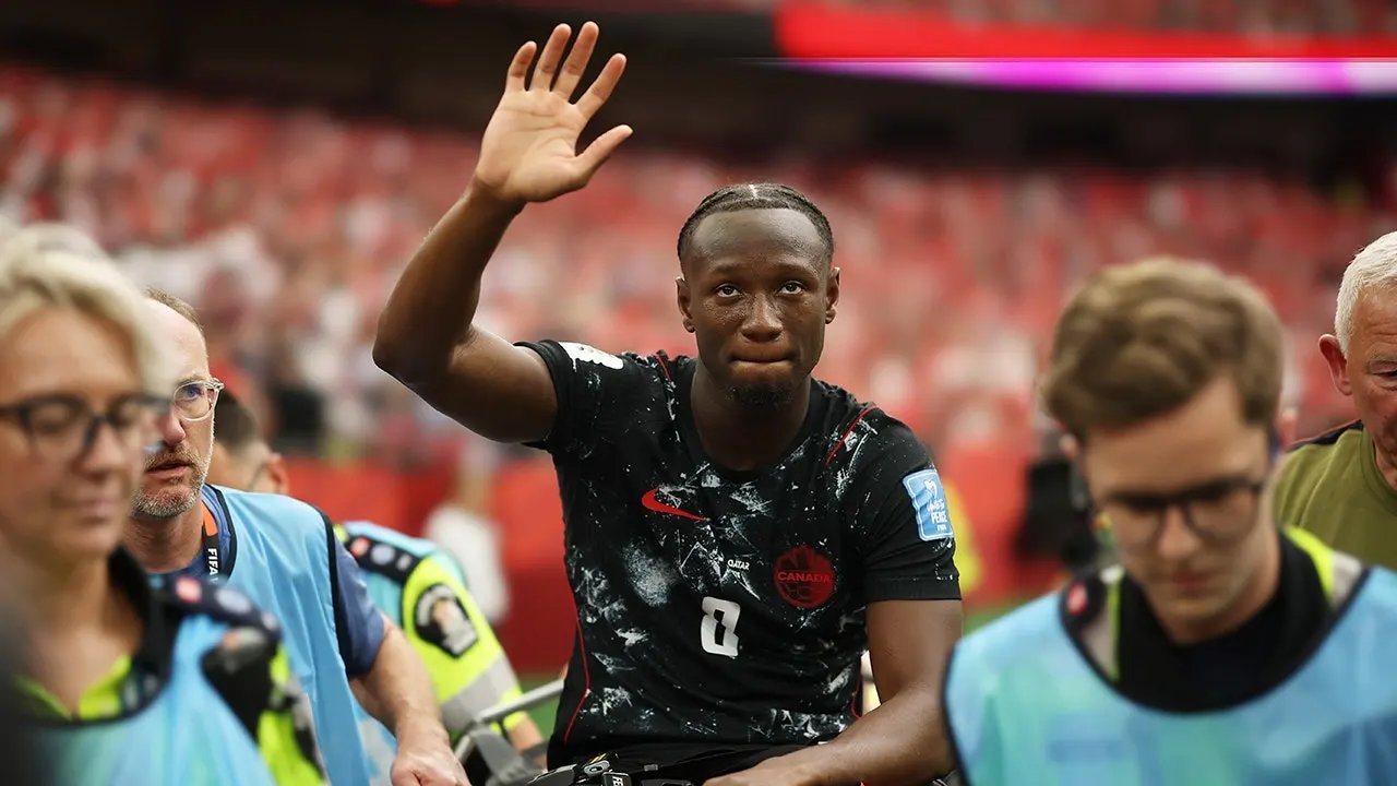 Canada's Ismaël Koné suffers horrific injury as Qatar's Assim Madibo gets red card for poor tackle