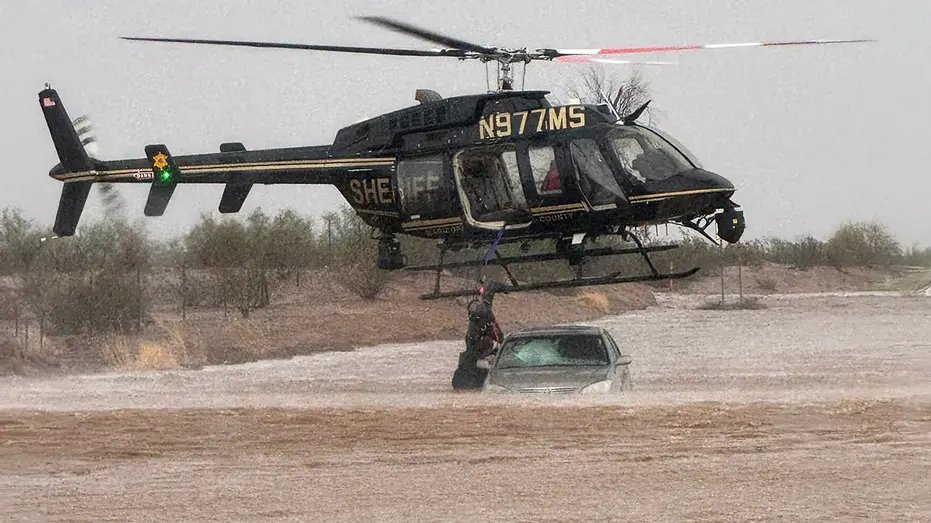 Arizona sheriff deploys helicopter to save 2 stranded in flooded car