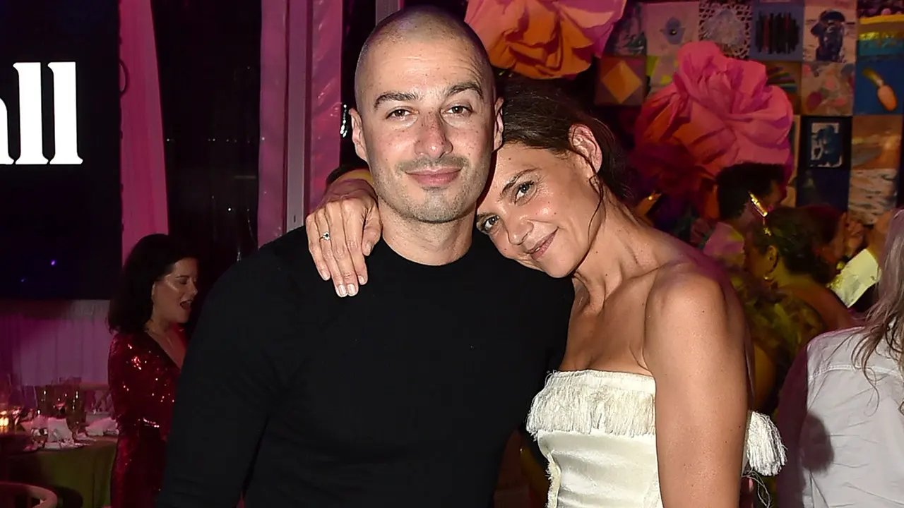 Katie Holmes sizzles in bikini as she kisses boyfriend during Lake Como getaway