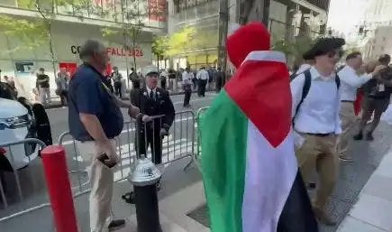 NYC firefighter caught on camera ripping pro-Palestinian agitator in Elmo costume near Ground Zero on 9/11