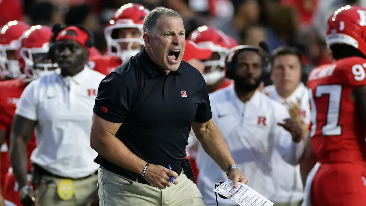 Rutgers' Greg Schiano crashes out on official after costly penalty in tough loss to USC