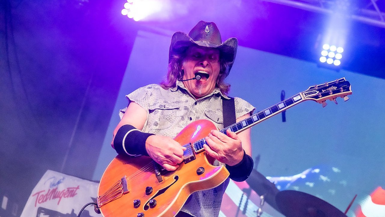 Ted Nugent proves he still lives up to Motor City Madman moniker as he poses with massive buck