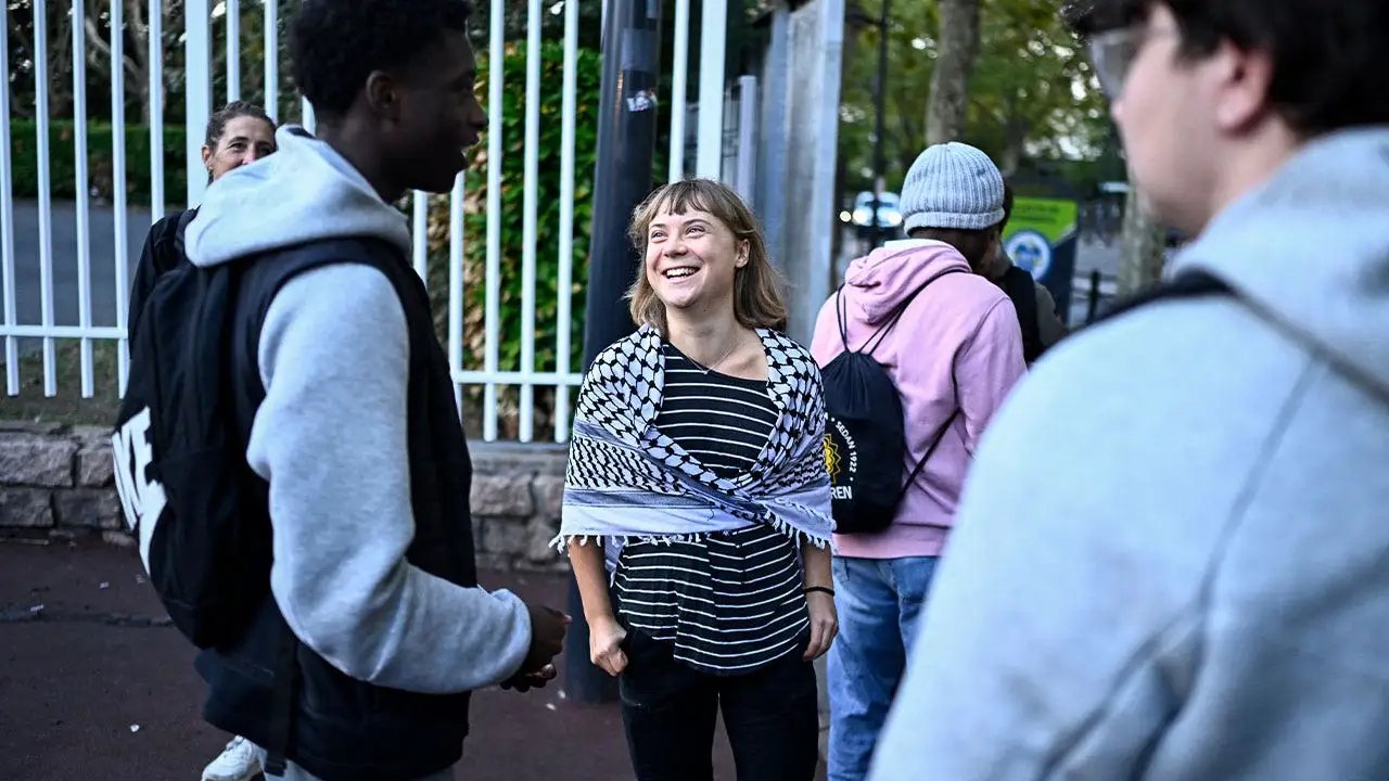 Greta Thunberg joins massive French student protests as cars burn, police fire tear gas