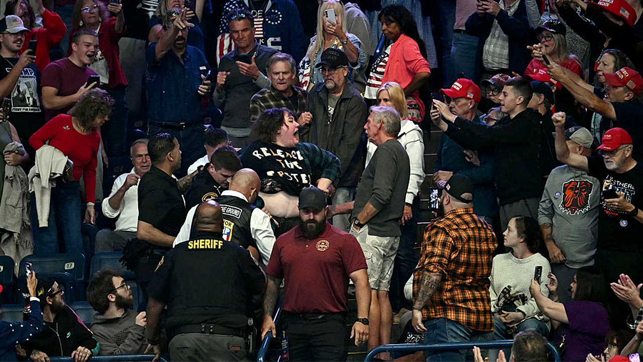 Protester punched in face by Trump supporter, mocked by president at Ohio rally: 'Gotta go on a diet'